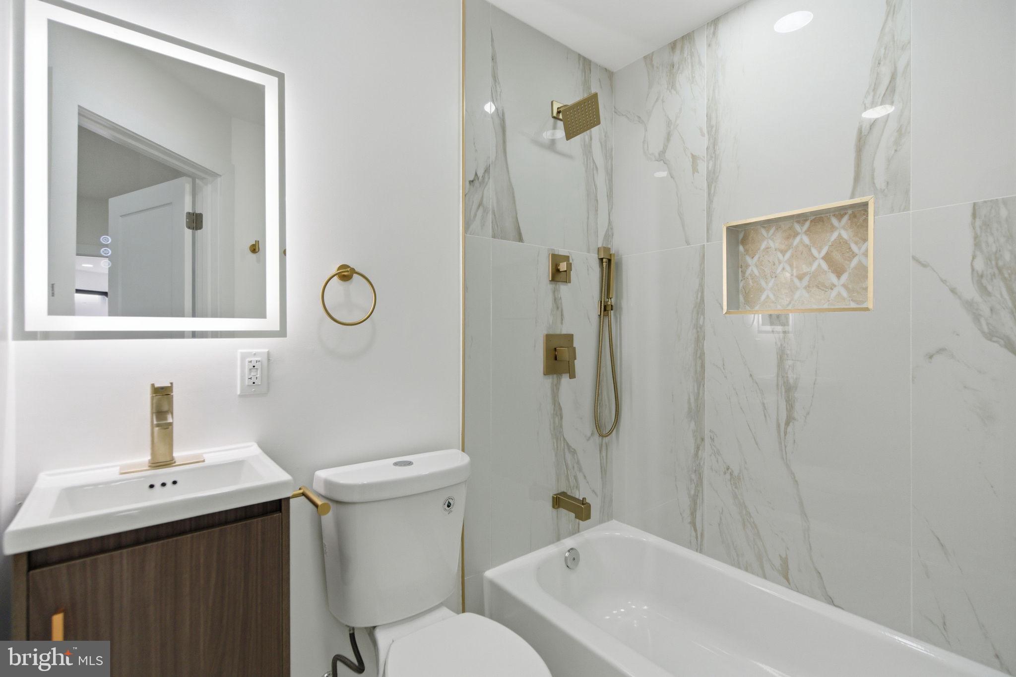 4662 James Street Philadelphia, PA 19137 - Photo 26 of 32 a bathroom with a sink toilet and shower