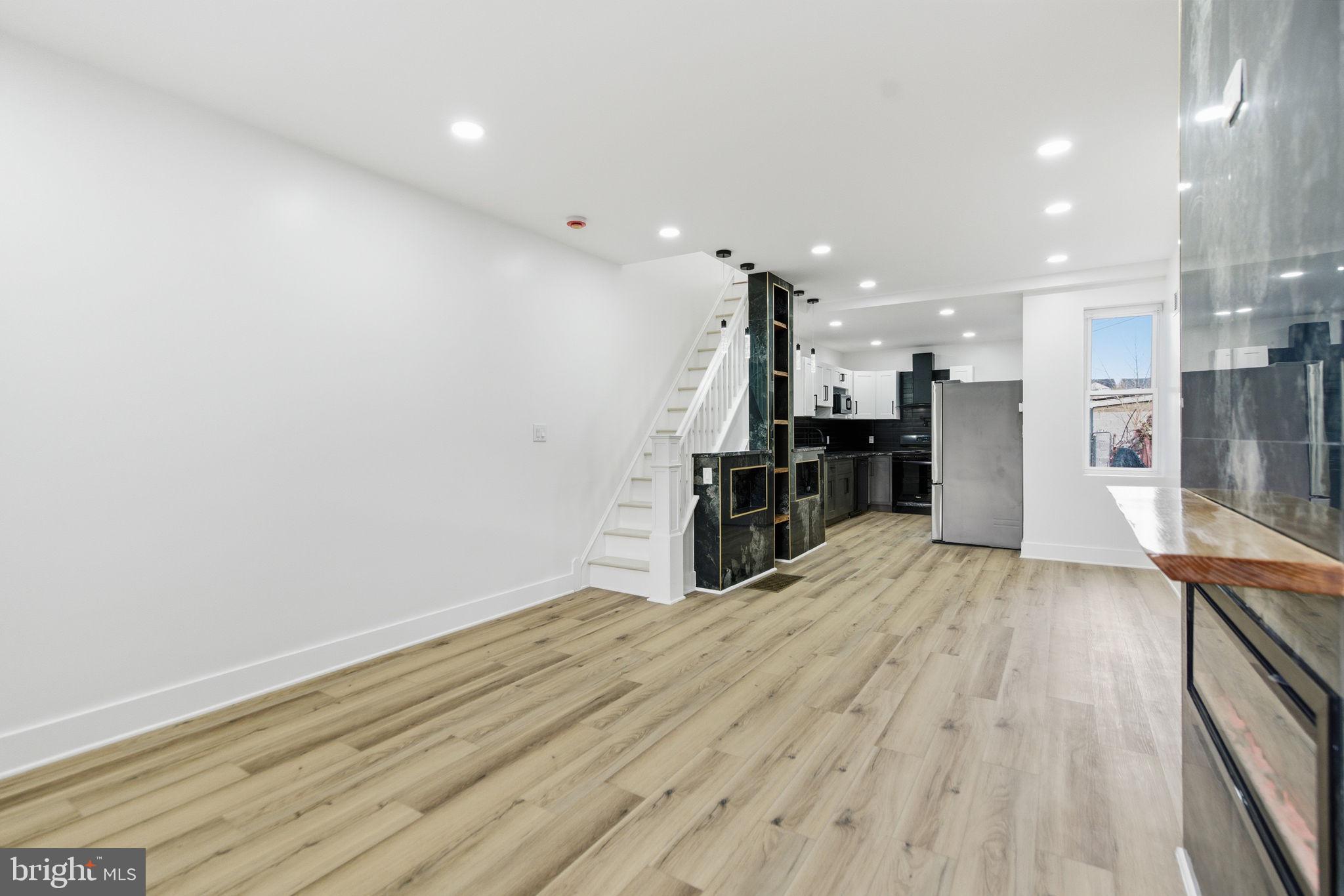 4662 James Street Philadelphia, PA 19137 - Photo 4 of 32 a view of empty room with wooden floor