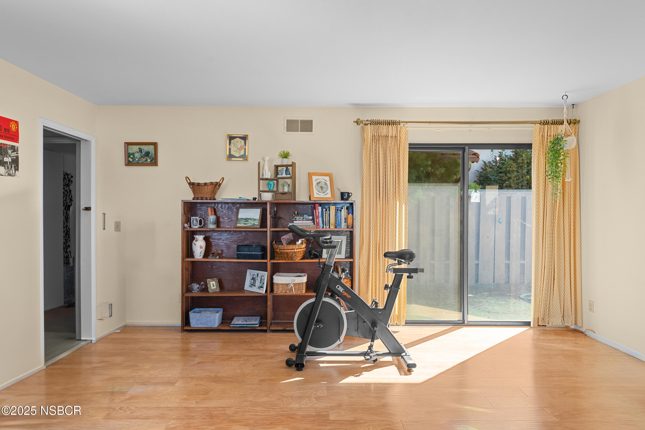 166 Tallyho Road Santa Maria, CA 93455 - Photo 14 of 46 a view of a workspace with furniture and a window