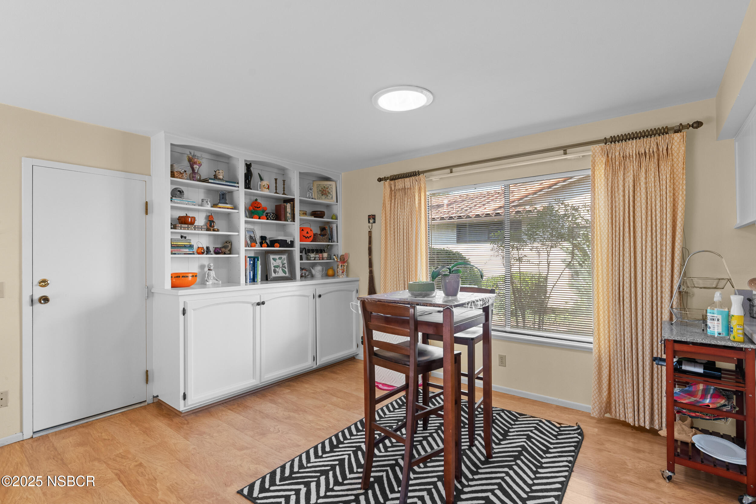 166 Tallyho Road Santa Maria, CA 93455 - Photo 16 of 46 a dining room with furniture and a window