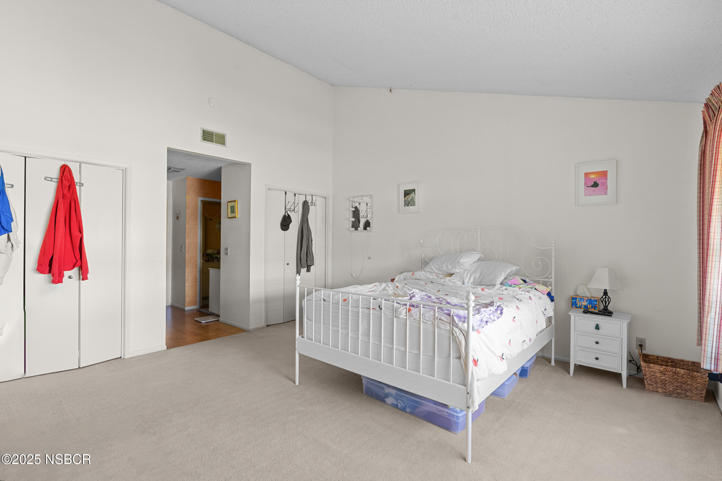 166 Tallyho Road Santa Maria, CA 93455 - Photo 26 of 46 a bed sitting in a bedroom next to a window