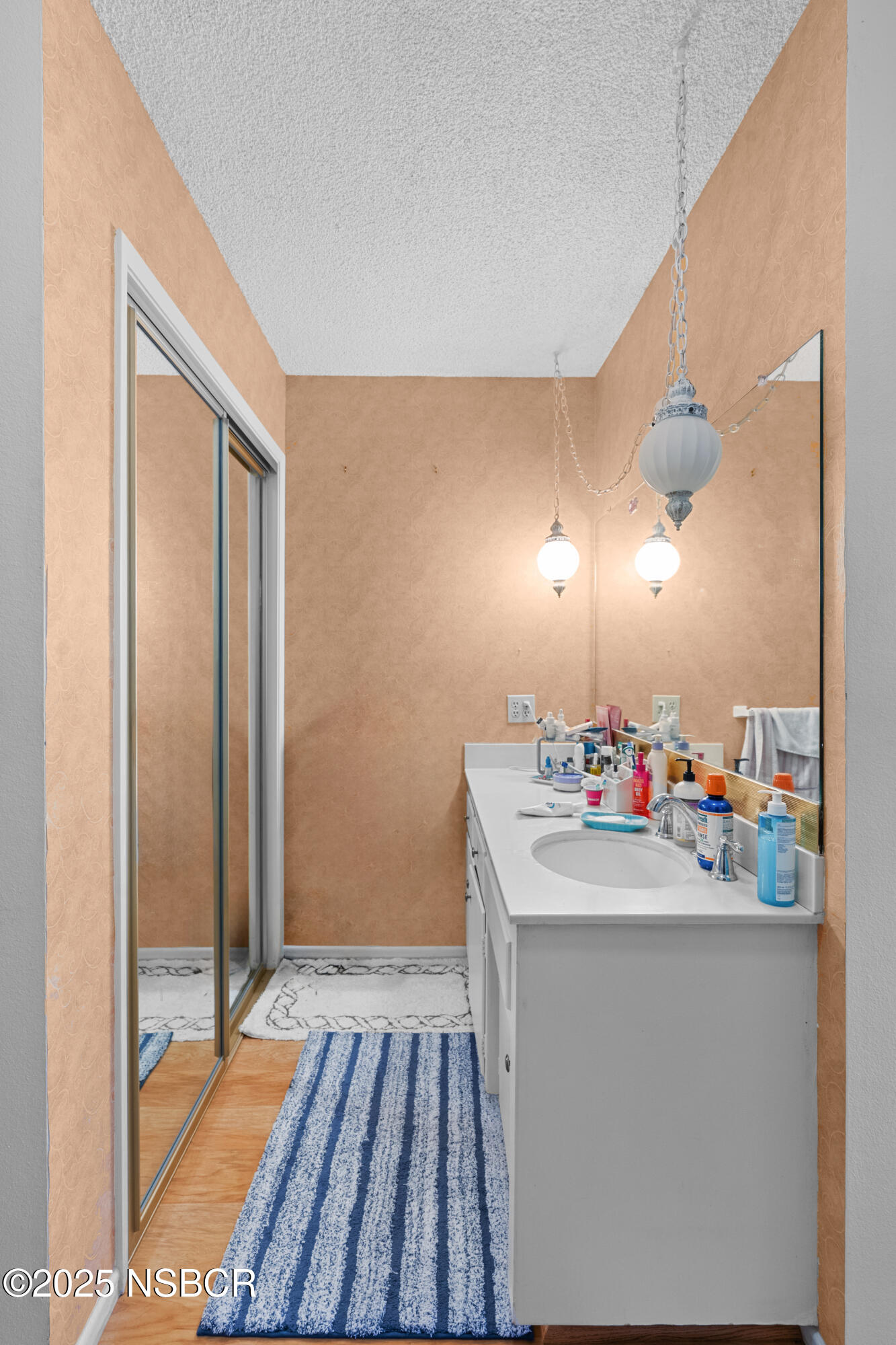 166 Tallyho Road Santa Maria, CA 93455 - Photo 28 of 46 a bathroom with a sink mirror and vanity