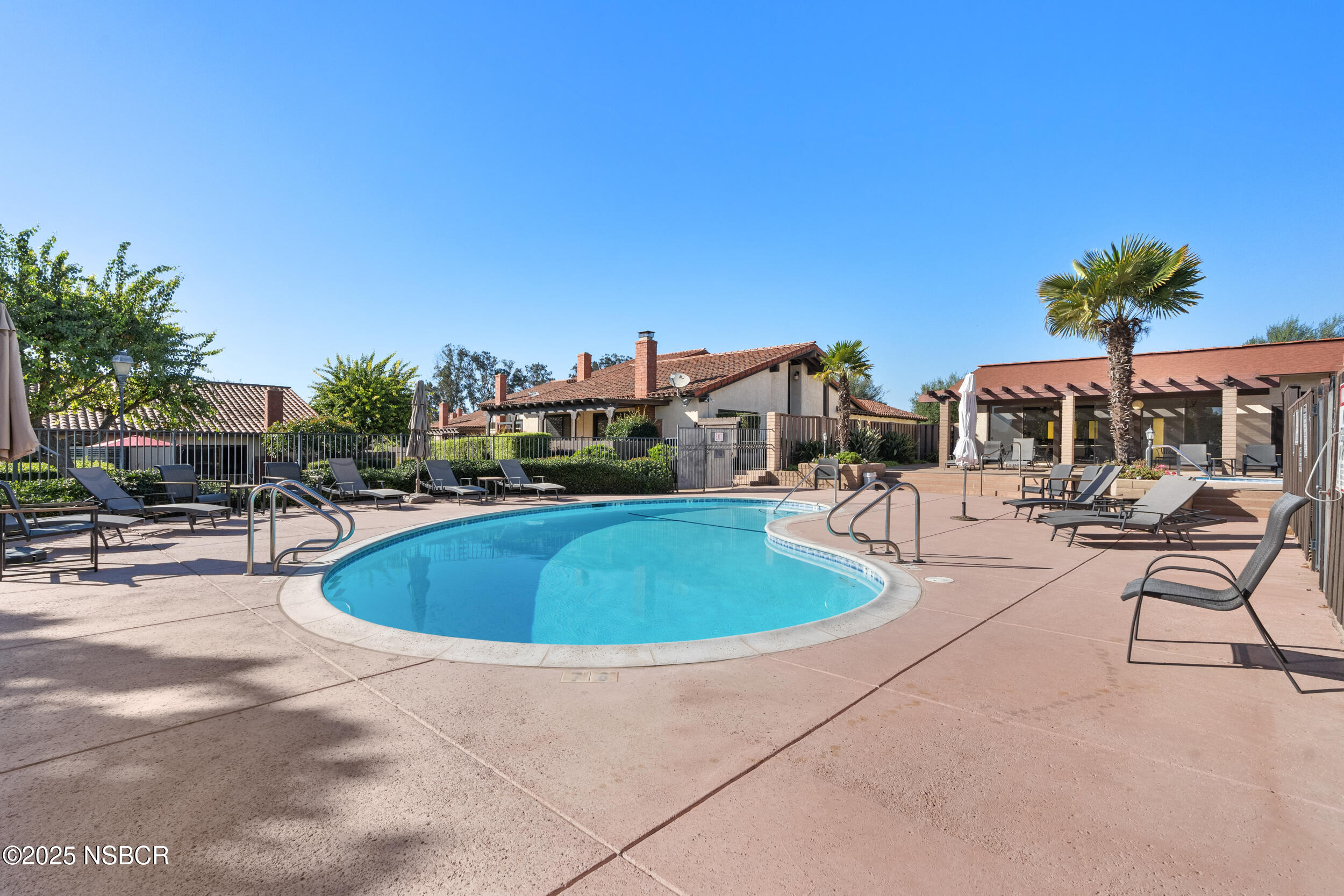 166 Tallyho Road Santa Maria, CA 93455 - Photo 41 of 46 a view of a swimming pool with chairs