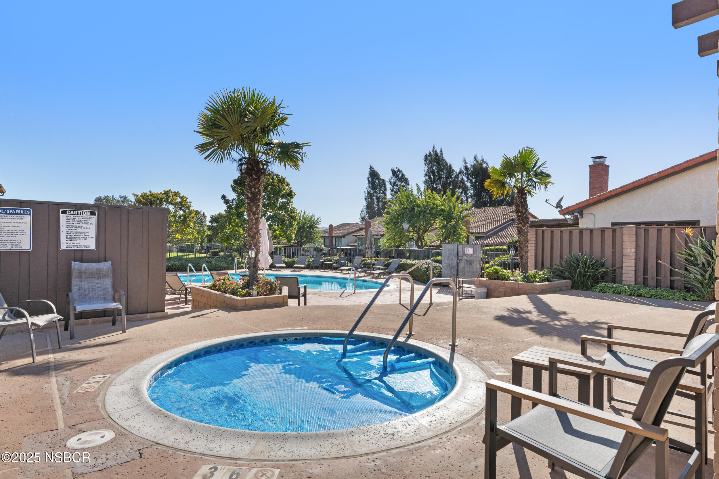 166 Tallyho Road Santa Maria, CA 93455 - Photo 43 of 46 a view of a swimming pool with a lounge chair