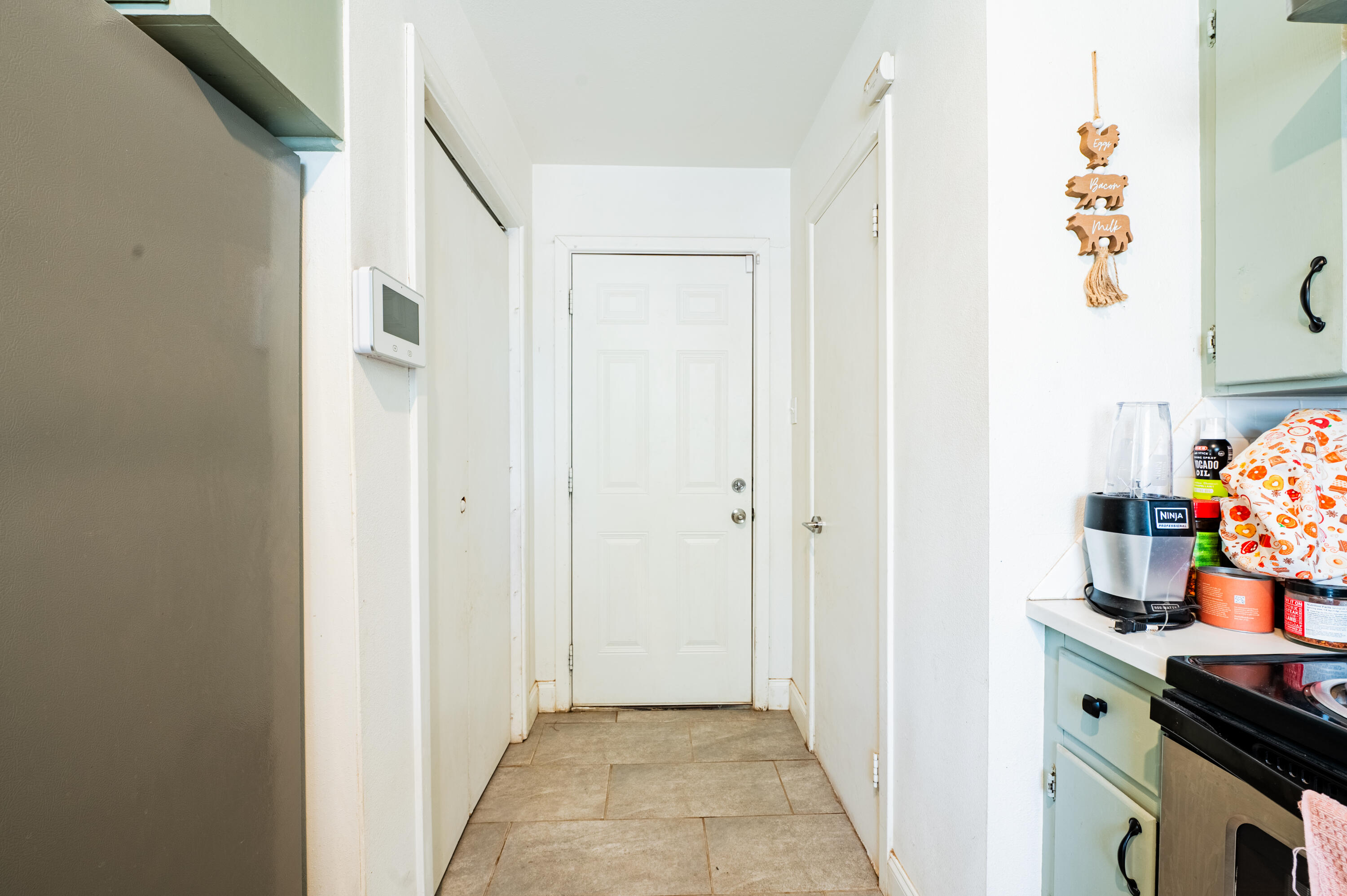 2618 48th Street Lubbock, TX 79413 - Photo 8 of 17 hallway near kitchen