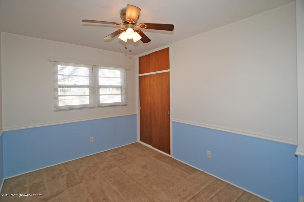 5106 Bowie Street Amarillo, TX 79110 - Photo 7 of 14 an empty room