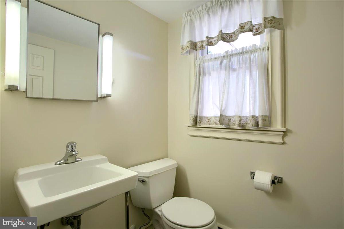 250 Blacksmith Road Camp Hill, PA 17011 - Photo 31 of 39 1/2 bath off the family room.