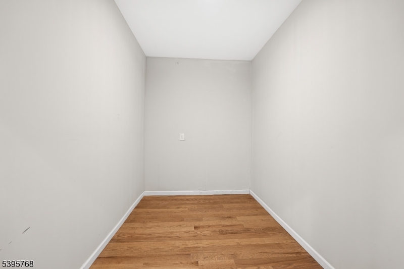 176 Union Avenue Rutherford, NJ 07070 - Photo 4 of 10 a view of wooden floor in a empty room