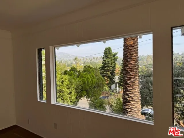 a view of a balcony from a window