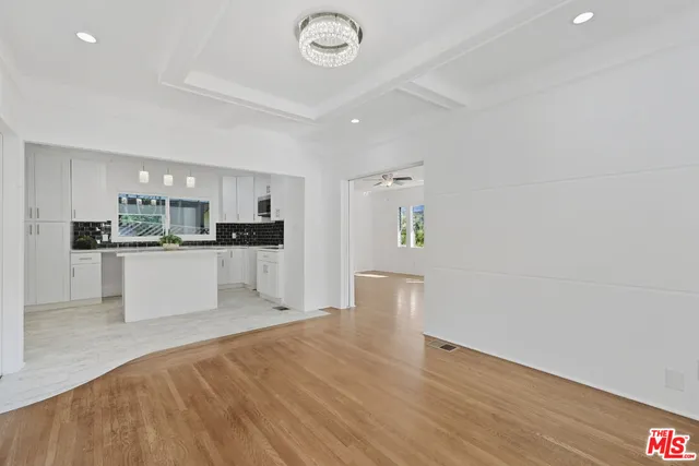 a view of kitchen with wooden floor
