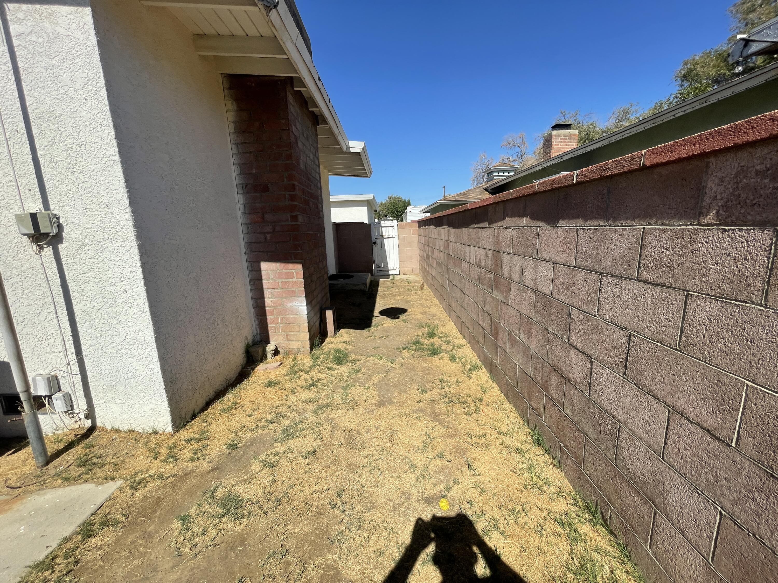 1372 Jenner Street Lancaster, CA 93534 - Photo 11 of 16 a view of a backyard of the house