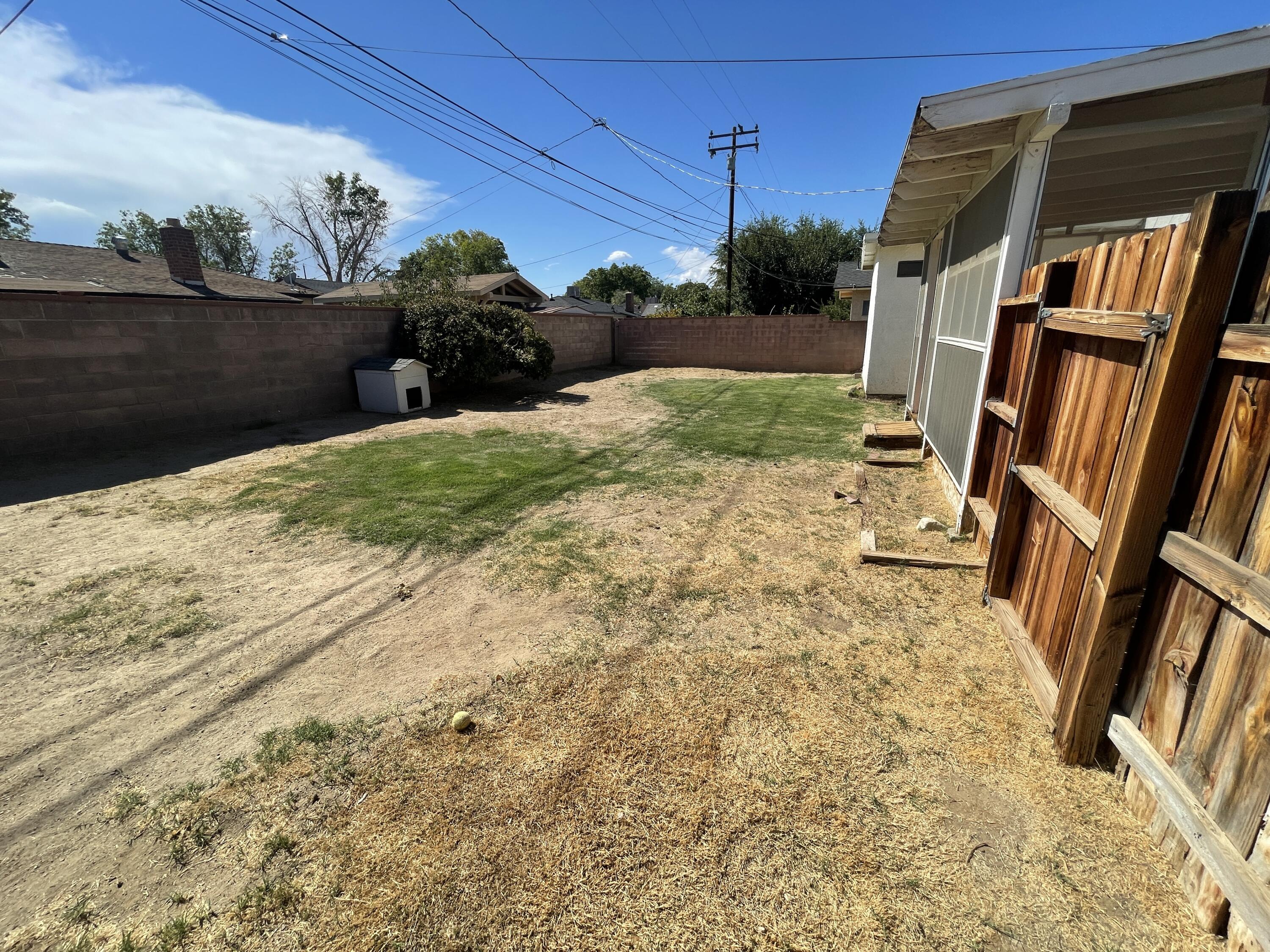 1372 Jenner Street Lancaster, CA 93534 - Photo 13 of 16 a view of a backyard with sitting area
