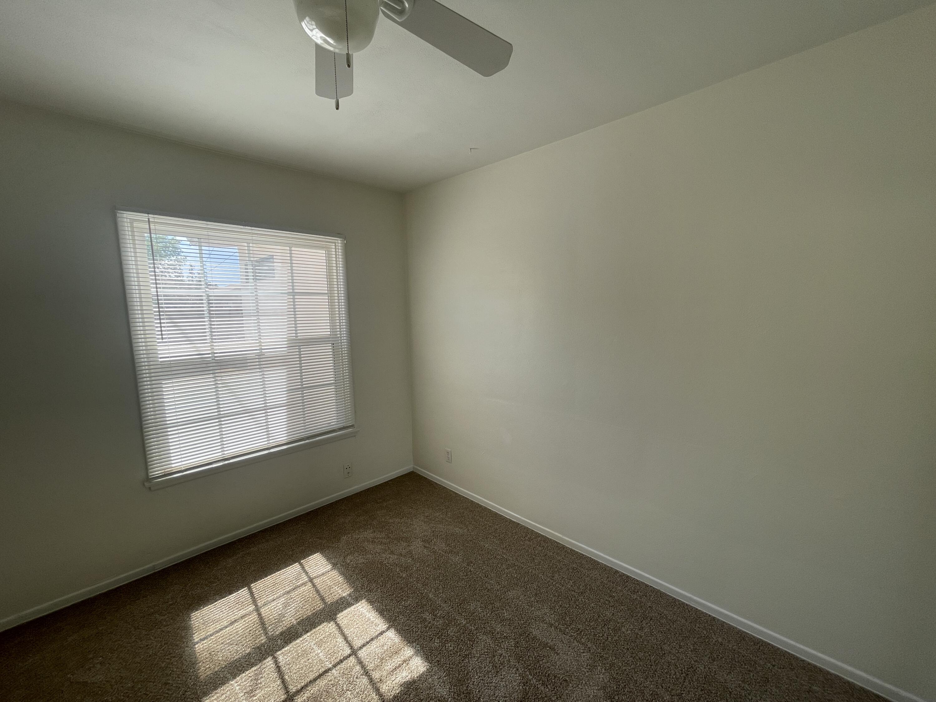 1372 Jenner Street Lancaster, CA 93534 - Photo 7 of 16 an empty room with windows