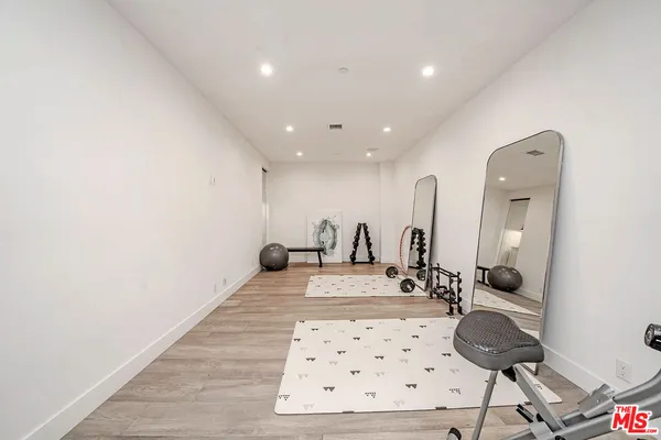a view of a kitchen with furniture and window