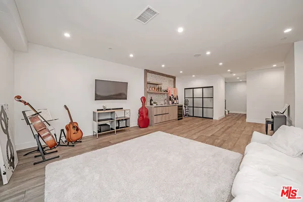 a utility room with sink dryer and washer