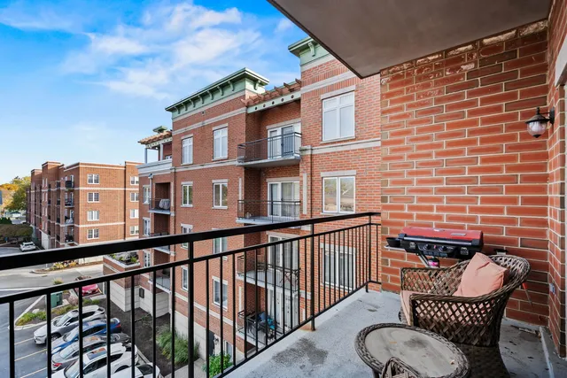 a view of a balcony with chairs