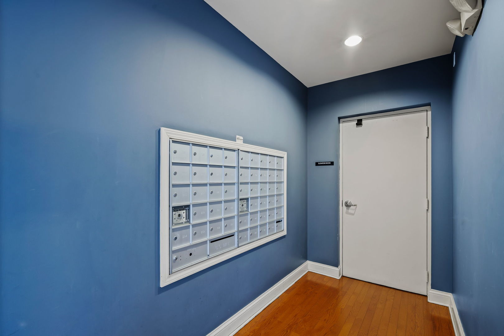 235 North Smith Street, Unit 412 Palatine, IL 60067 - Photo 17 of 18 a view of room with window and wooden floor