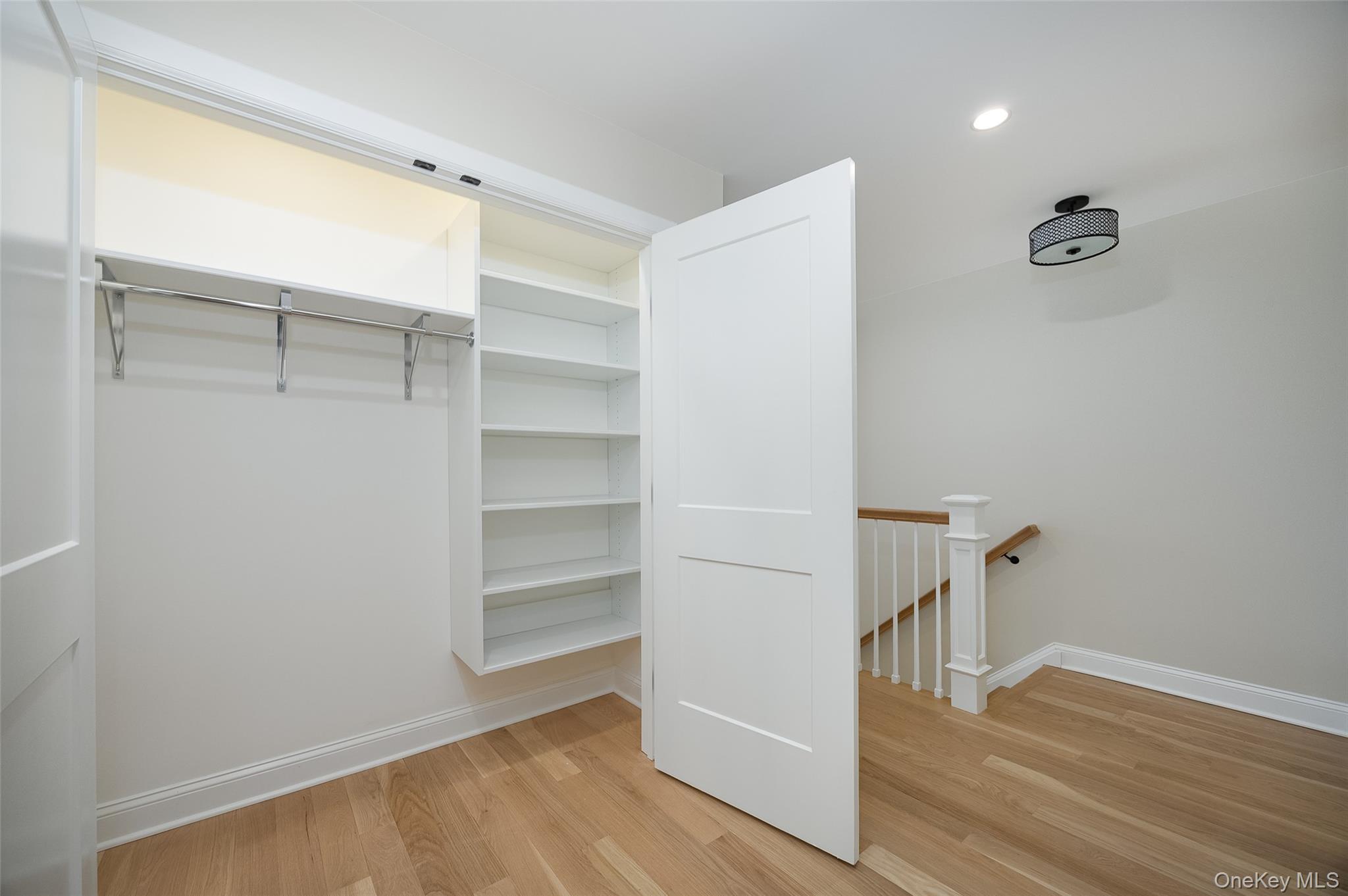 19 Henry Street, Unit 4 Beacon, NY 12508 - Photo 18 of 29 a view of walk in closet with empty racks