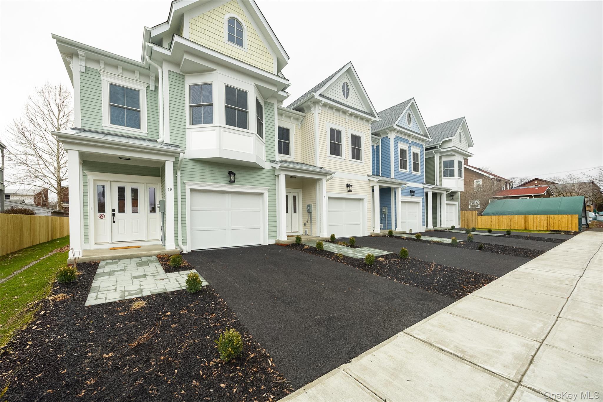 19 Henry Street, Unit 4 Beacon, NY 12508 - Photo 2 of 29 a front view of a house with a yard