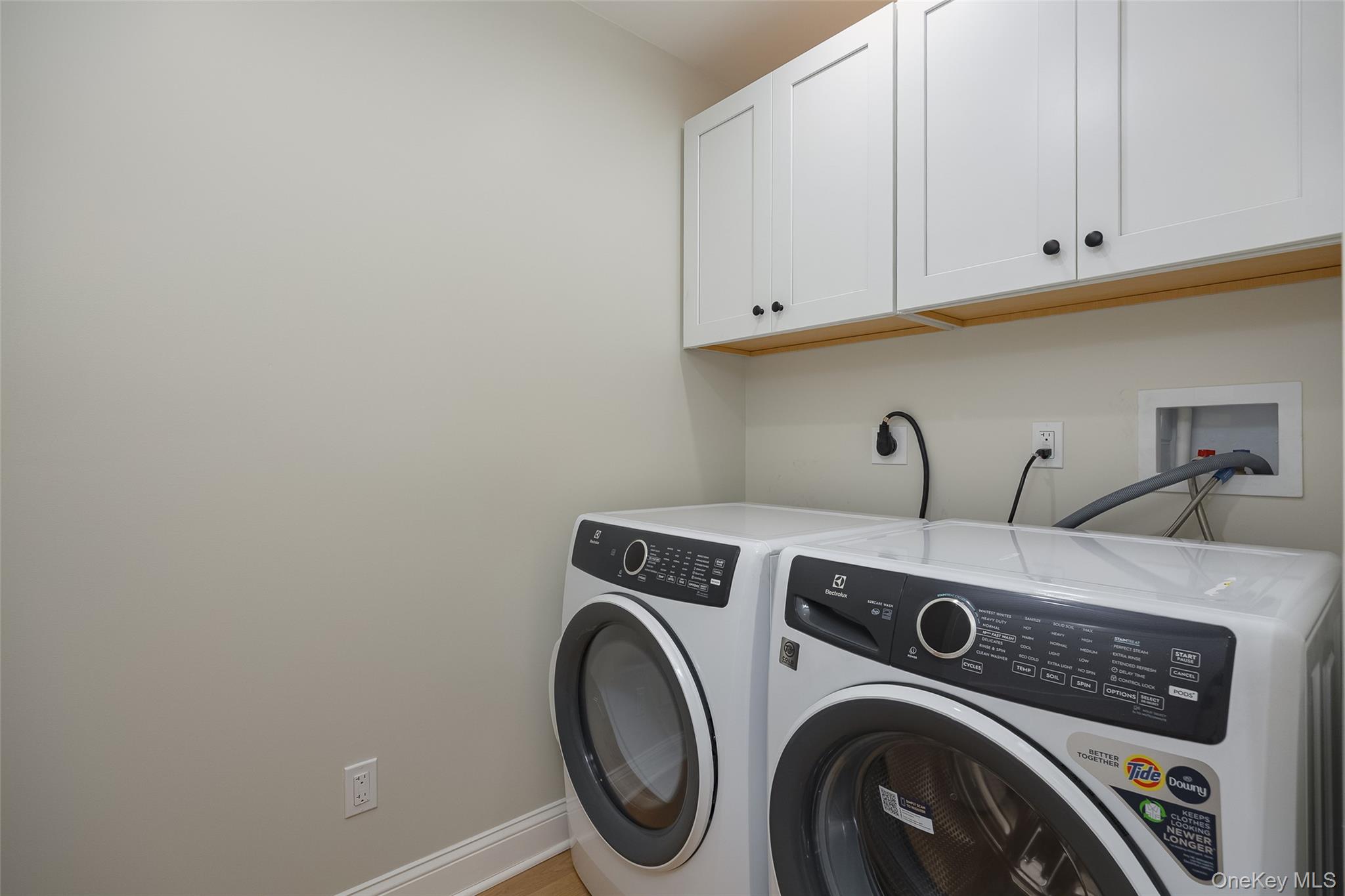 19 Henry Street, Unit 4 Beacon, NY 12508 - Photo 22 of 26 a utility room with dryer and washer