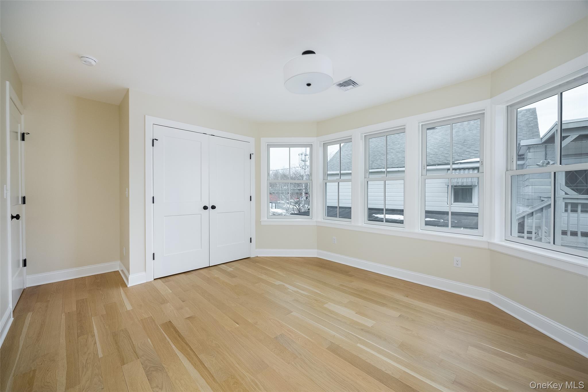 19 Henry Street, Unit 4 Beacon, NY 12508 - Photo 22 of 29 a view of an empty room with a window