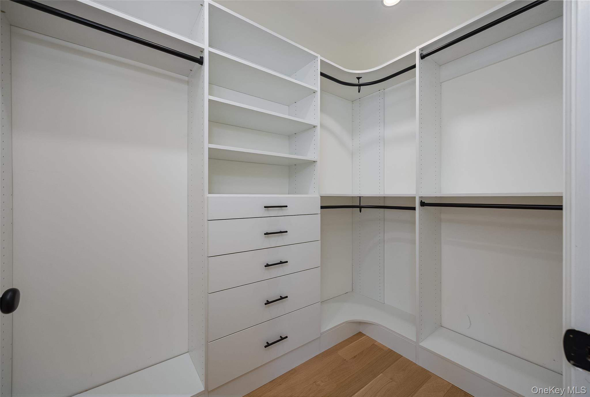 19 Henry Street, Unit 4 Beacon, NY 12508 - Photo 23 of 29 a view of walk in closet with empty racks