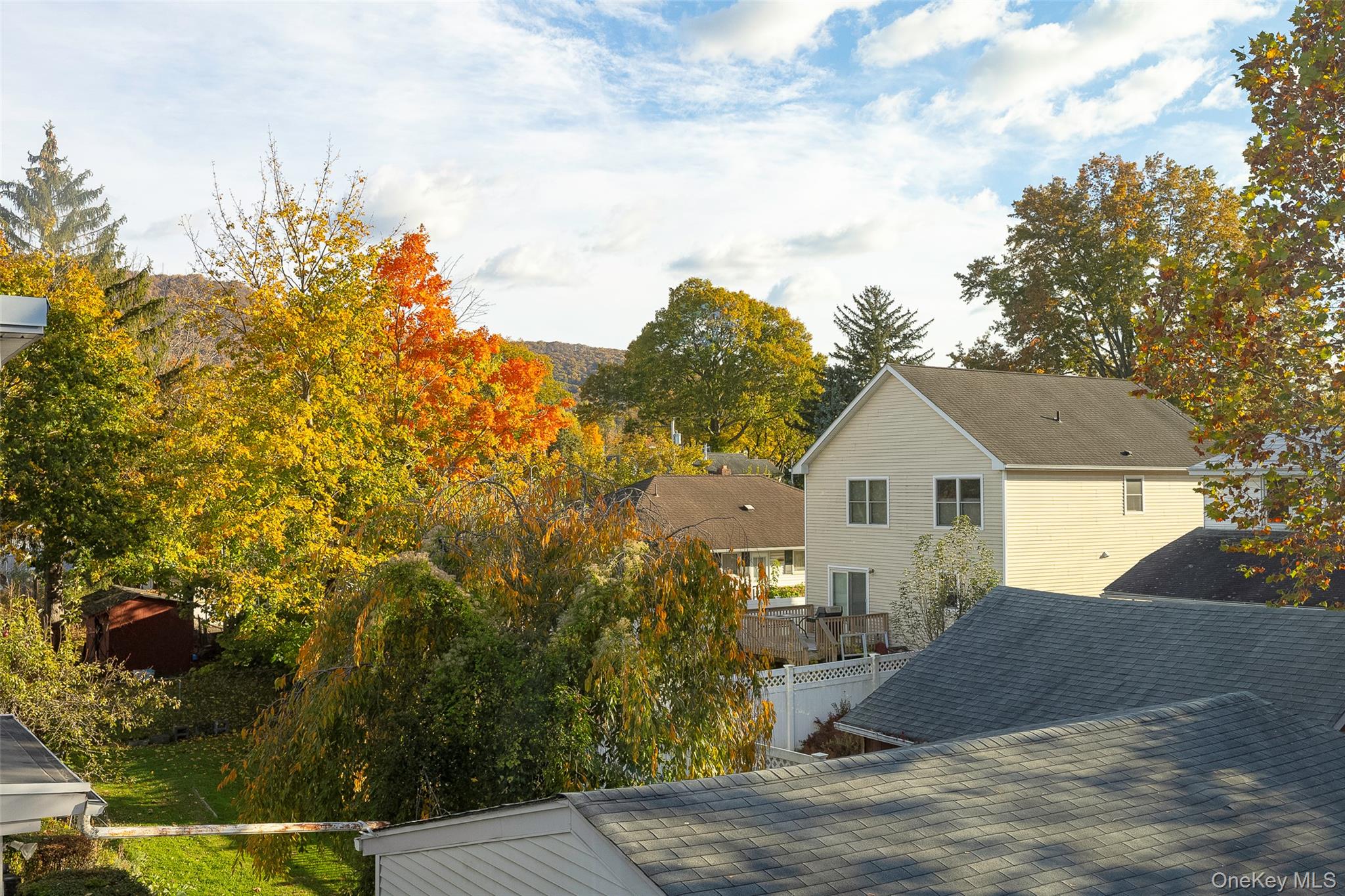 19 Henry Street, Unit 4 Beacon, NY 12508 - Photo 25 of 26 a view of a house with a tree in front of it