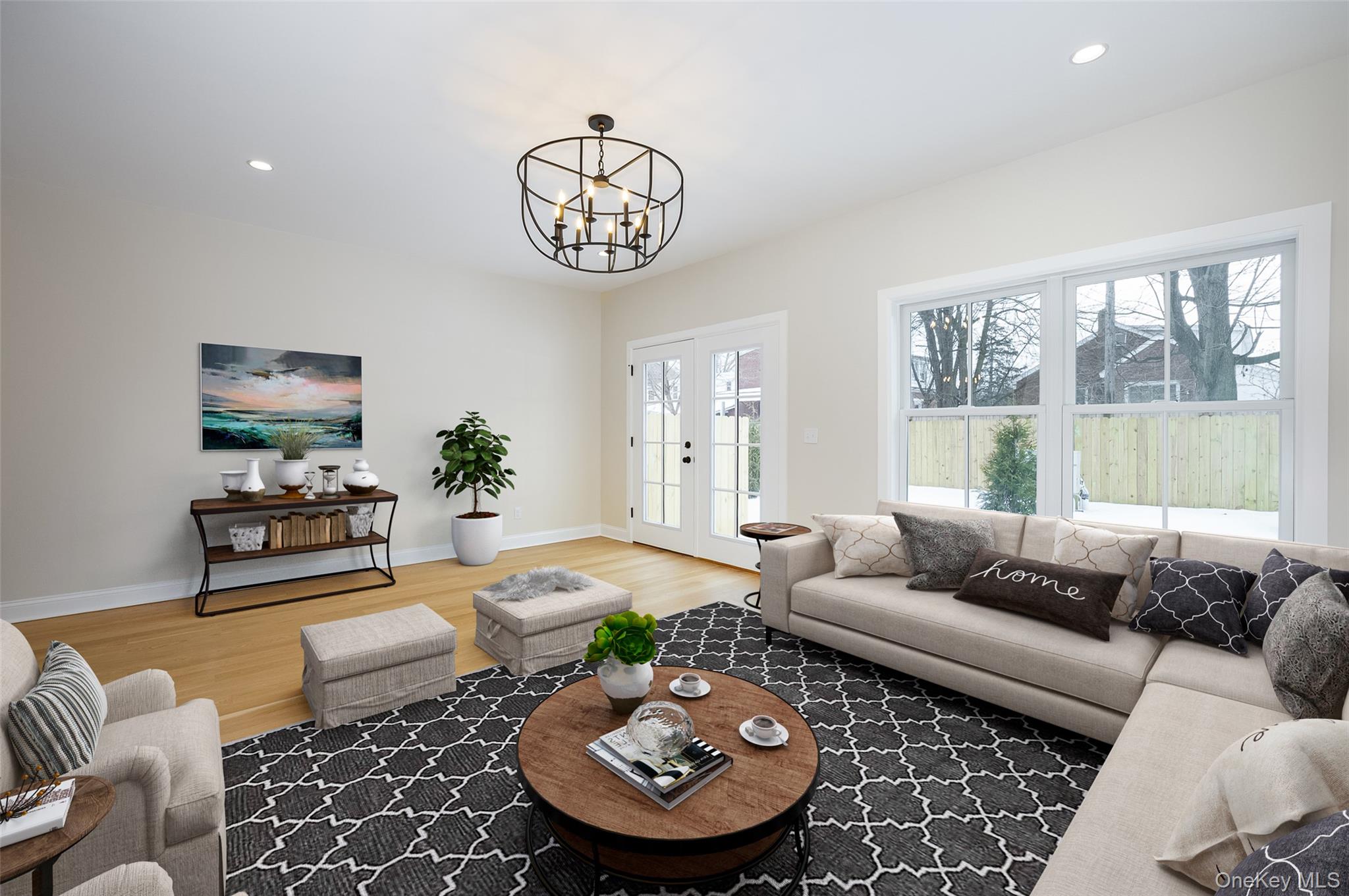 19 Henry Street, Unit 4 Beacon, NY 12508 - Photo 6 of 29 a living room with furniture a rug and a large window