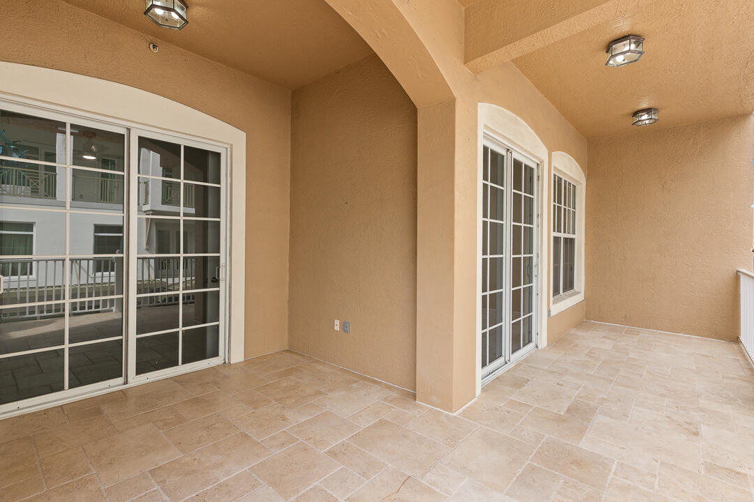 47 Southwest Osceola Street, Unit 206 Stuart, FL 34994 - Photo 25 of 47 a view of empty room with windows