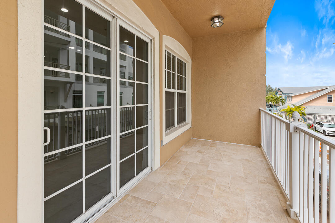 47 Southwest Osceola Street, Unit 206 Stuart, FL 34994 - Photo 26 of 47 a view of an empty room with a window