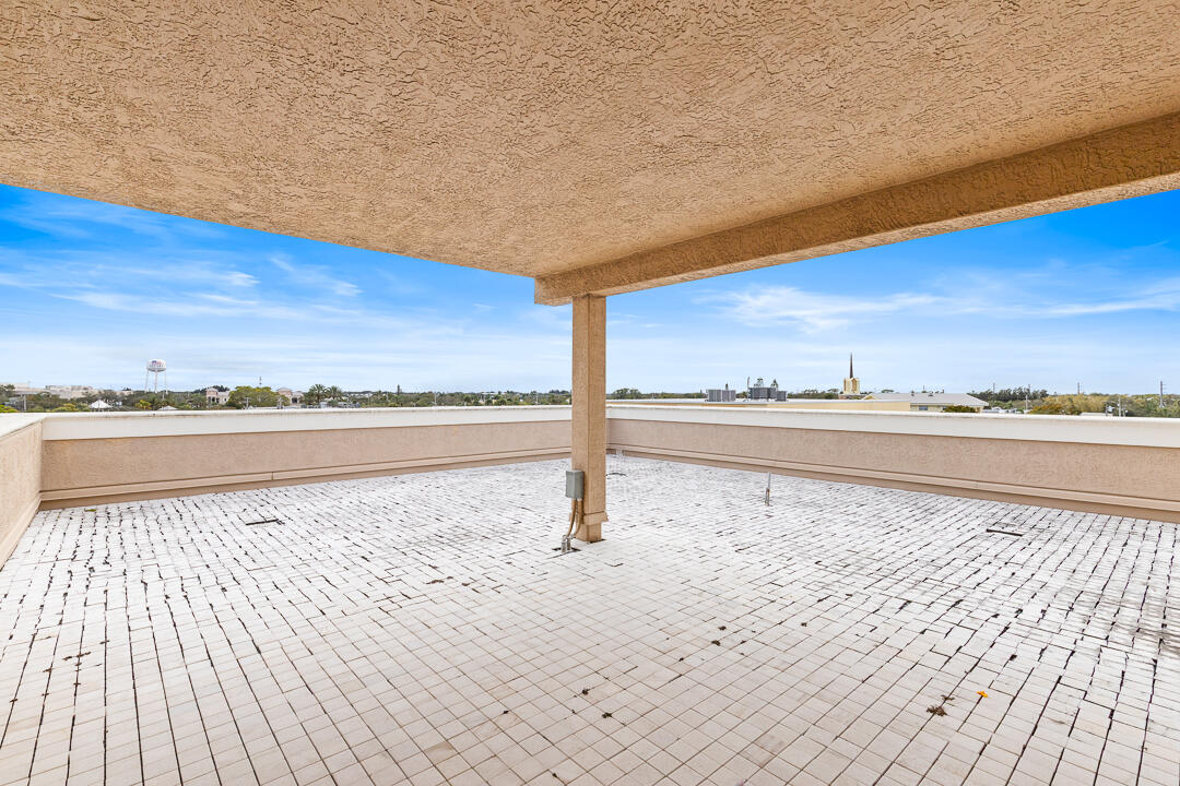 47 Southwest Osceola Street, Unit 206 Stuart, FL 34994 - Photo 27 of 47 a view of terrace with wooden floor