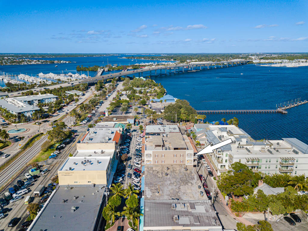 47 Southwest Osceola Street, Unit 206 Stuart, FL 34994 - Photo 45 of 47 an aerial view of residential houses with outdoor space