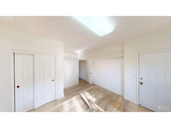 a bathroom with a sink mirror and a bathtub