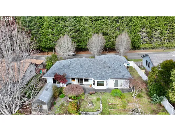 a black and white photo of a house