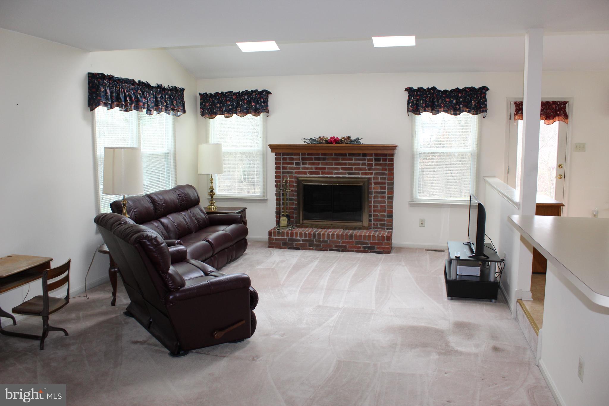 2290 Weigner Road Lansdale, PA 19446 - Photo 5 of 44 Family room w wood fireplace