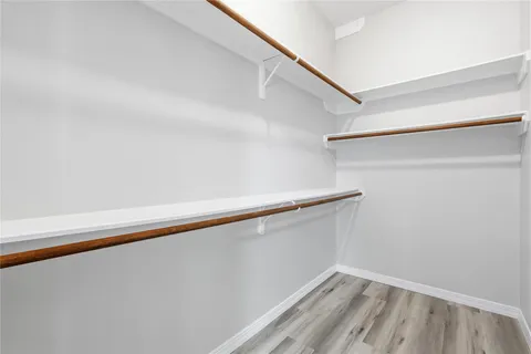 a view of a hallway with staircase