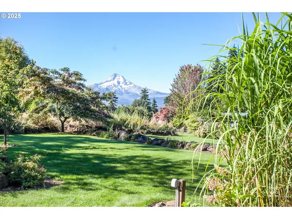 a view of a golf course with a big yard