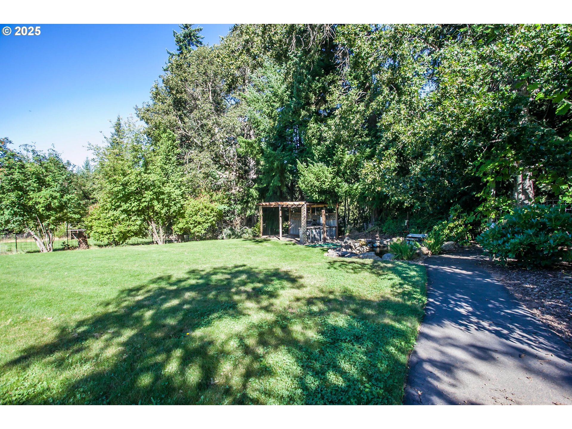6270 Miller Road Mount Hood Parkdale, OR 97041 - Photo 21 of 48 a backyard of a house with yard and trampoline