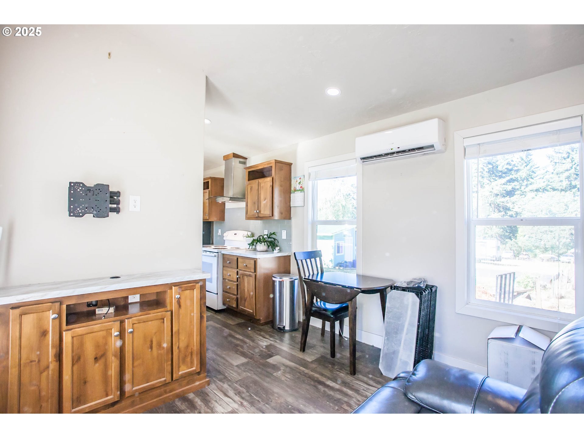 6270 Miller Road Mount Hood Parkdale, OR 97041 - Photo 32 of 48 a living room with furniture a window and wooden floor