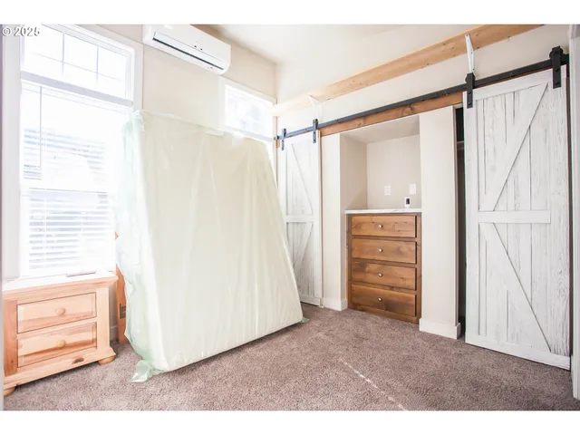 a view of yard with swimming pool and green space