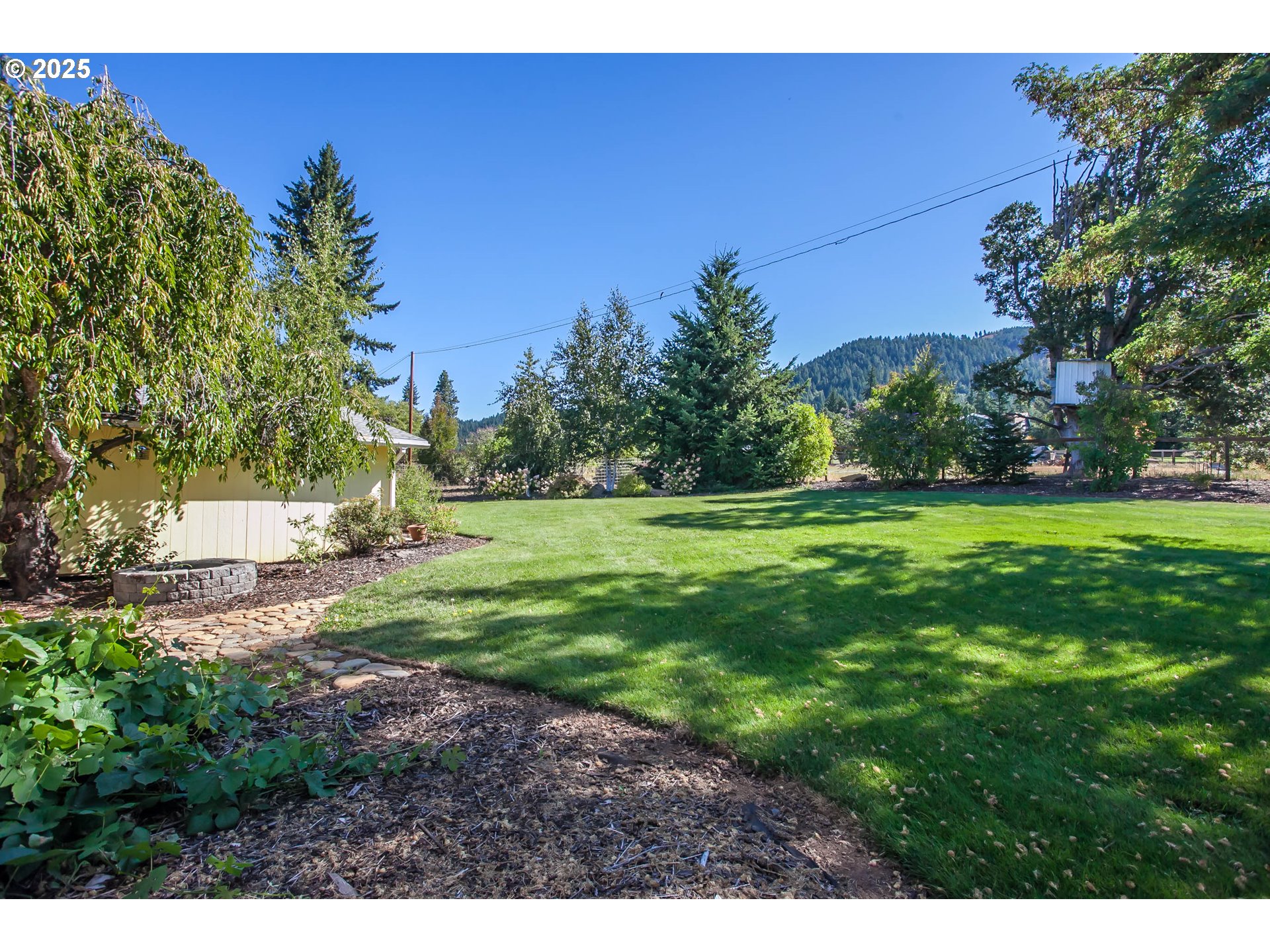 6270 Miller Road Mount Hood Parkdale, OR 97041 - Photo 4 of 48 a view of a green field