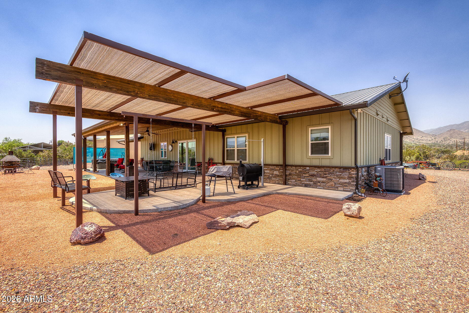 828 North Gun Creek Road Payson, AZ 85541 - Photo 35 of 57 a view of a backyard with a patio
