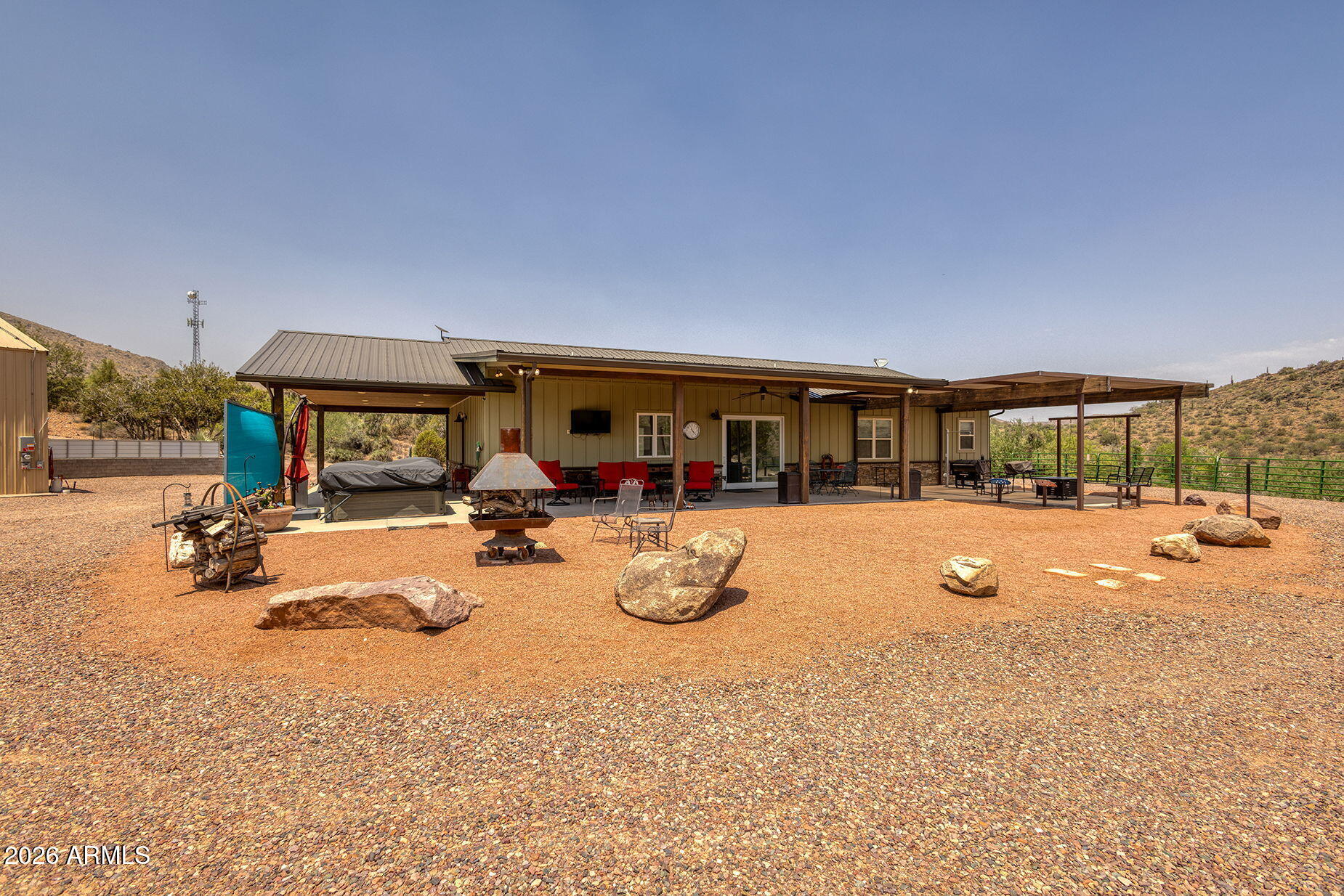 828 North Gun Creek Road Payson, AZ 85541 - Photo 37 of 57 a view of a house with swimming pool and sitting area