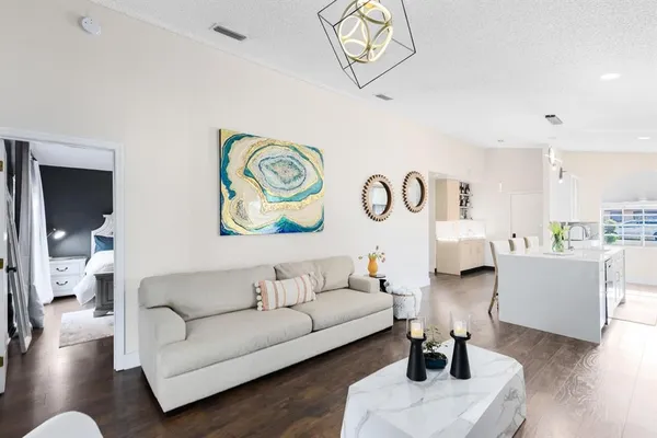 a living room with furniture and a table