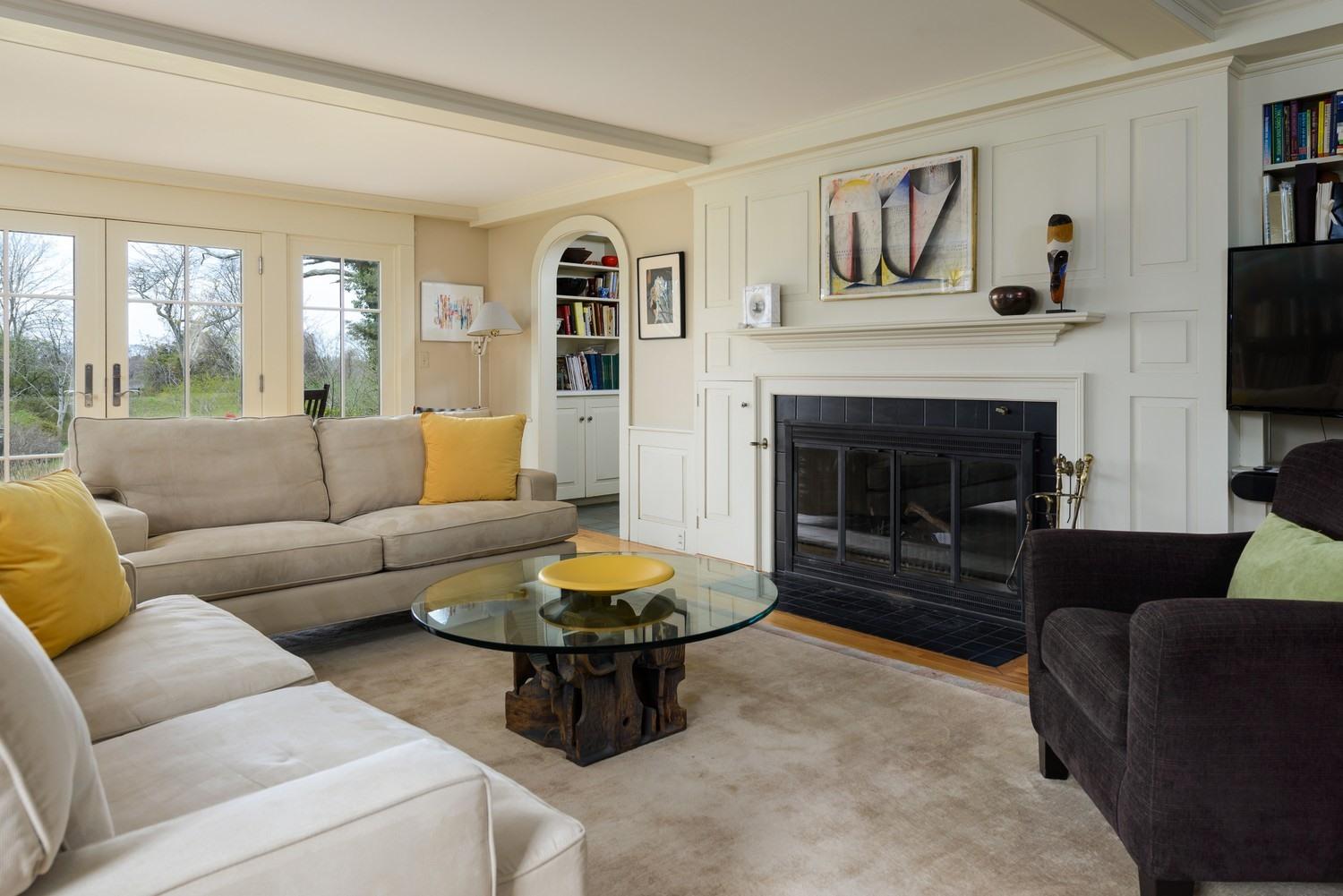 115 Rendezvous Lane Barnstable, MA 02630 - Photo 13 of 34 a living room with furniture and a fireplace