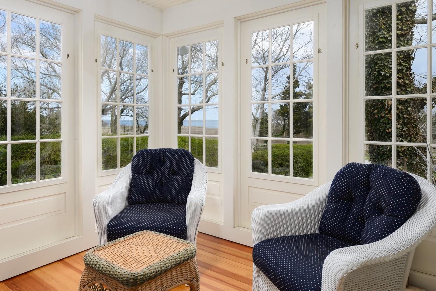 115 Rendezvous Lane Barnstable, MA 02630 - Photo 16 of 34 a living room with furniture and a large window