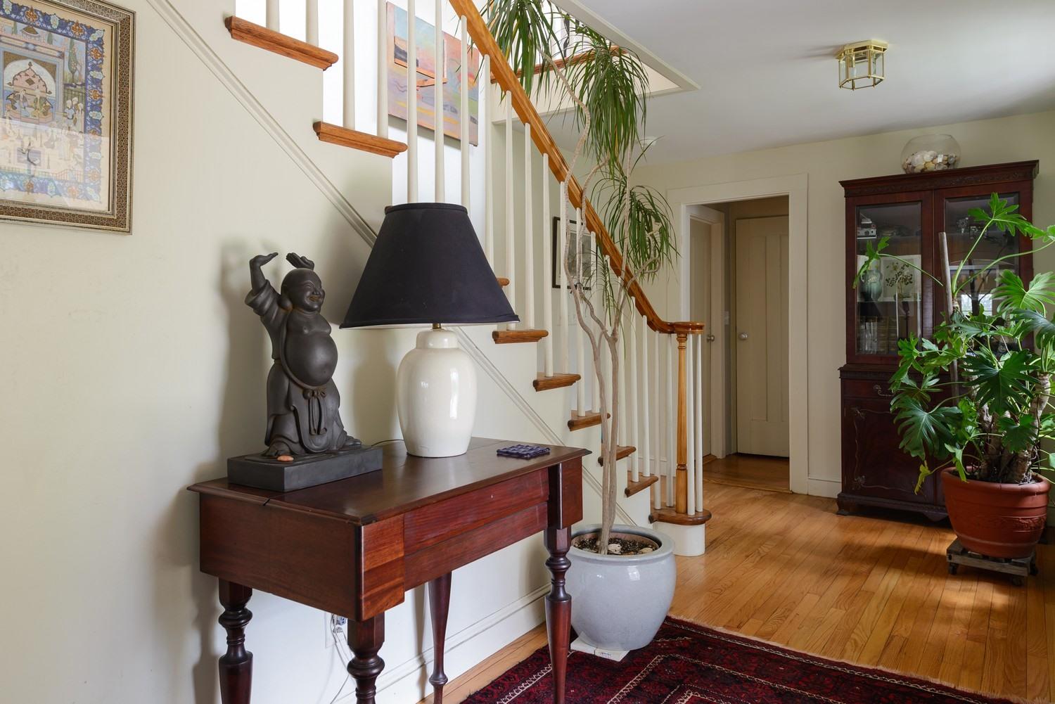 115 Rendezvous Lane Barnstable, MA 02630 - Photo 22 of 34 a living room with furniture and a potted plant