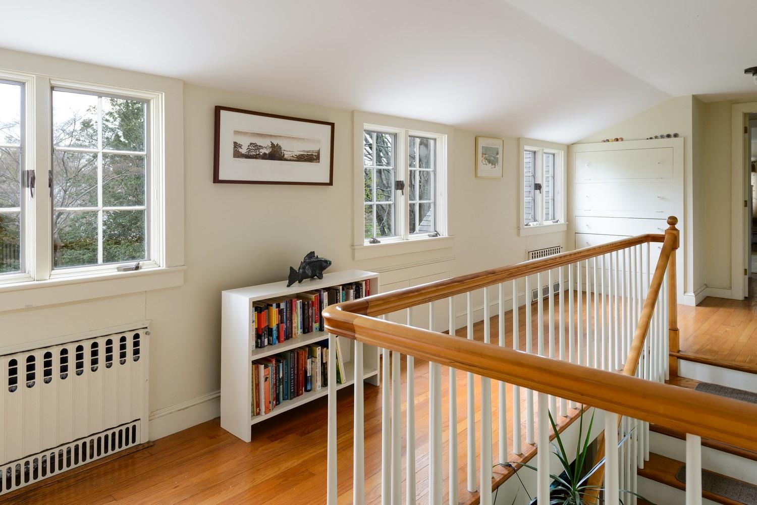 115 Rendezvous Lane Barnstable, MA 02630 - Photo 23 of 34 a view of staircase with wooden floor and windows