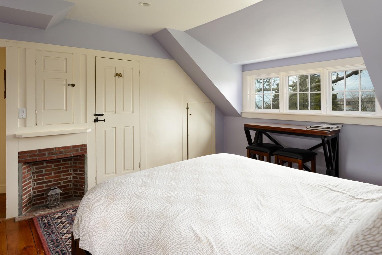 115 Rendezvous Lane Barnstable, MA 02630 - Photo 25 of 34 a large white bed in a bedroom next to a window