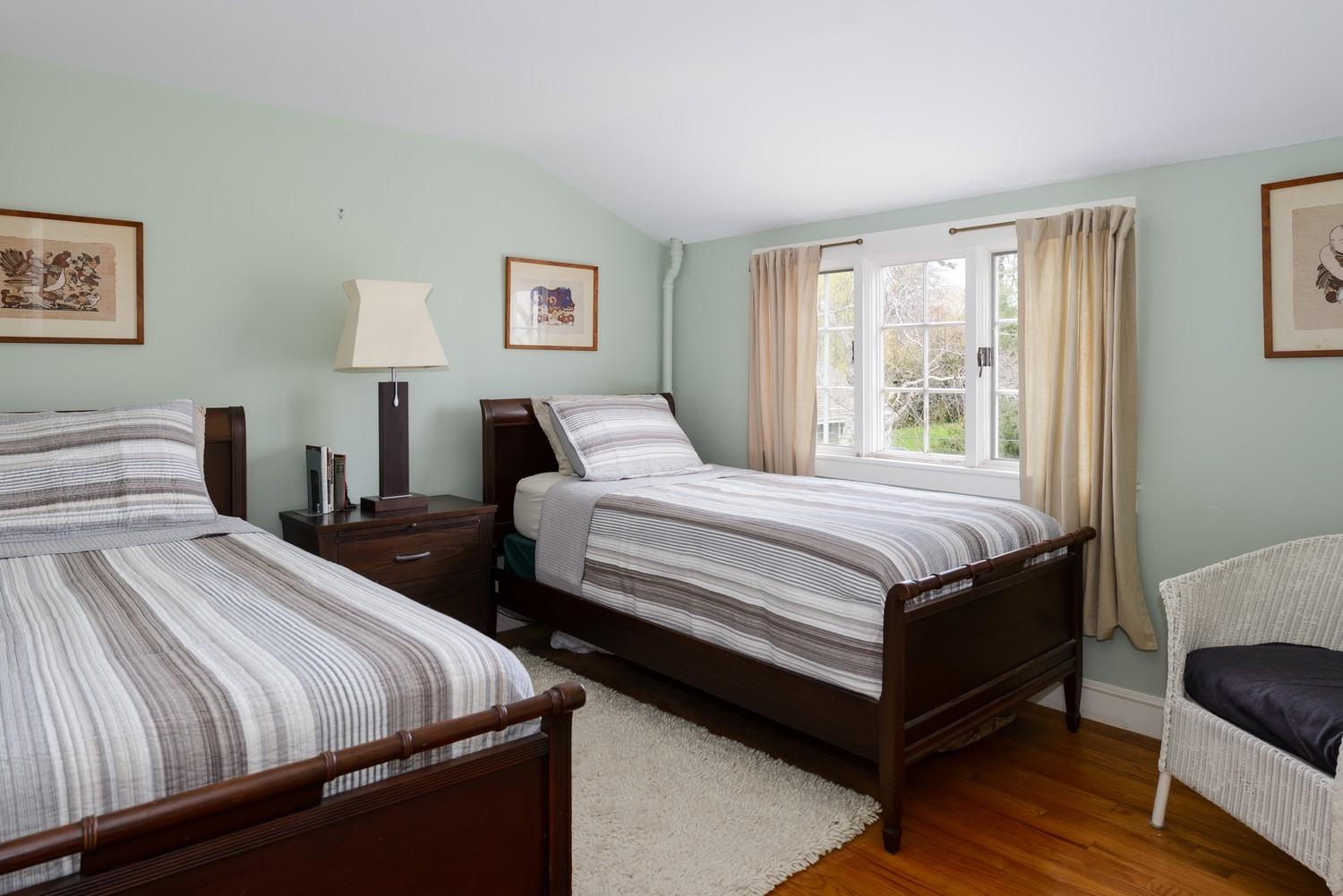 115 Rendezvous Lane Barnstable, MA 02630 - Photo 27 of 34 a bedroom with bed and a window
